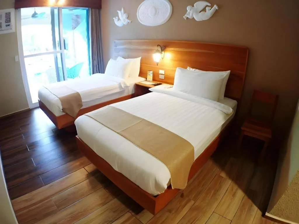 Bed in Roman Empire Panglao Boutique Resort