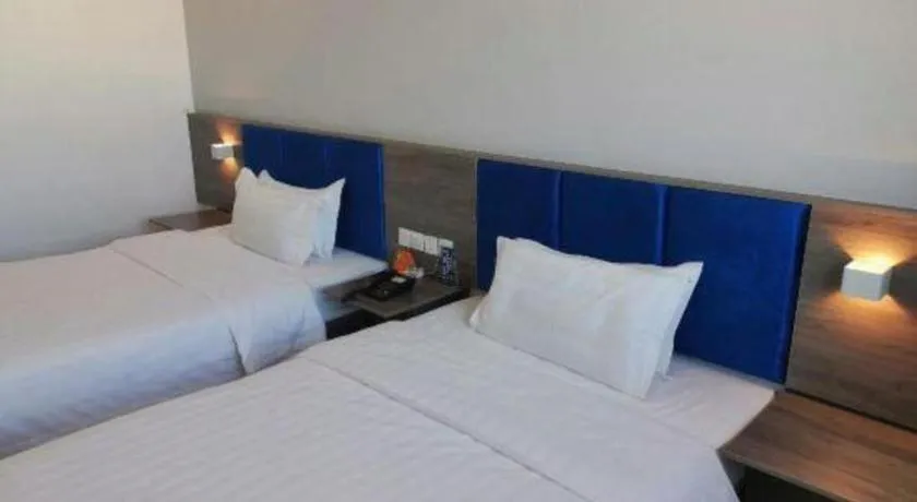 Bed in 7 Days Inn Lvliang Bus Terminal