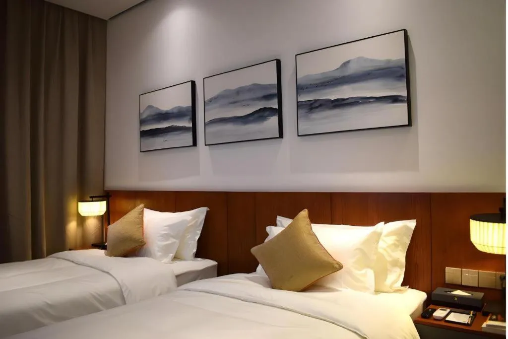 Bed in H Life Hotel (Shenzhen Sea World Branch)