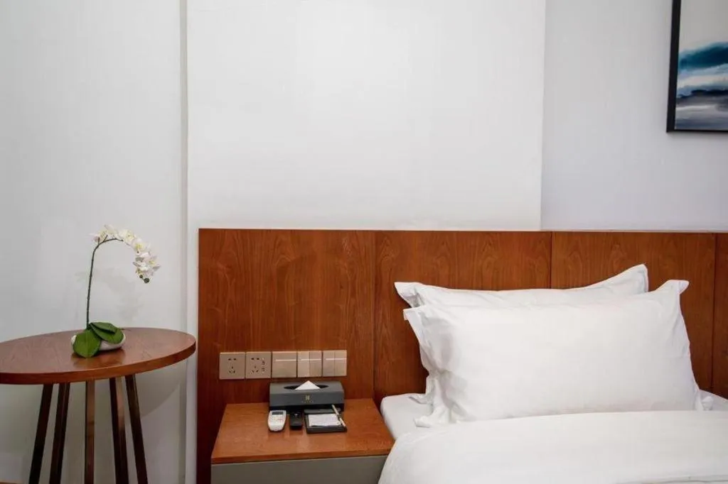 Bed in H Life Hotel (Shenzhen Sea World Branch)