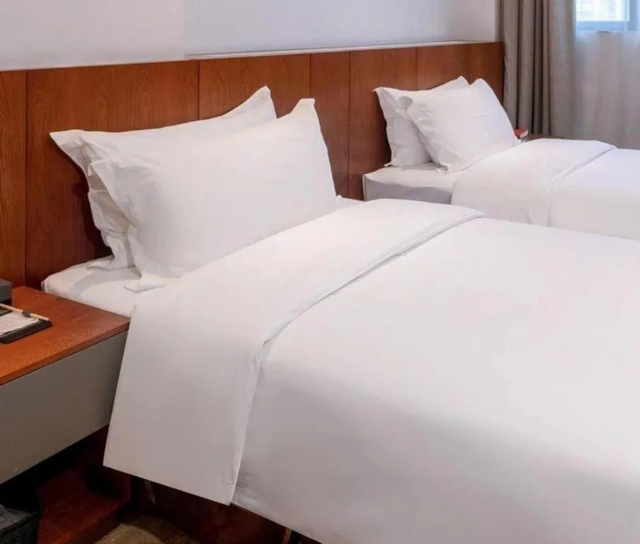 Bed in H Life Hotel (Shenzhen Sea World Branch)