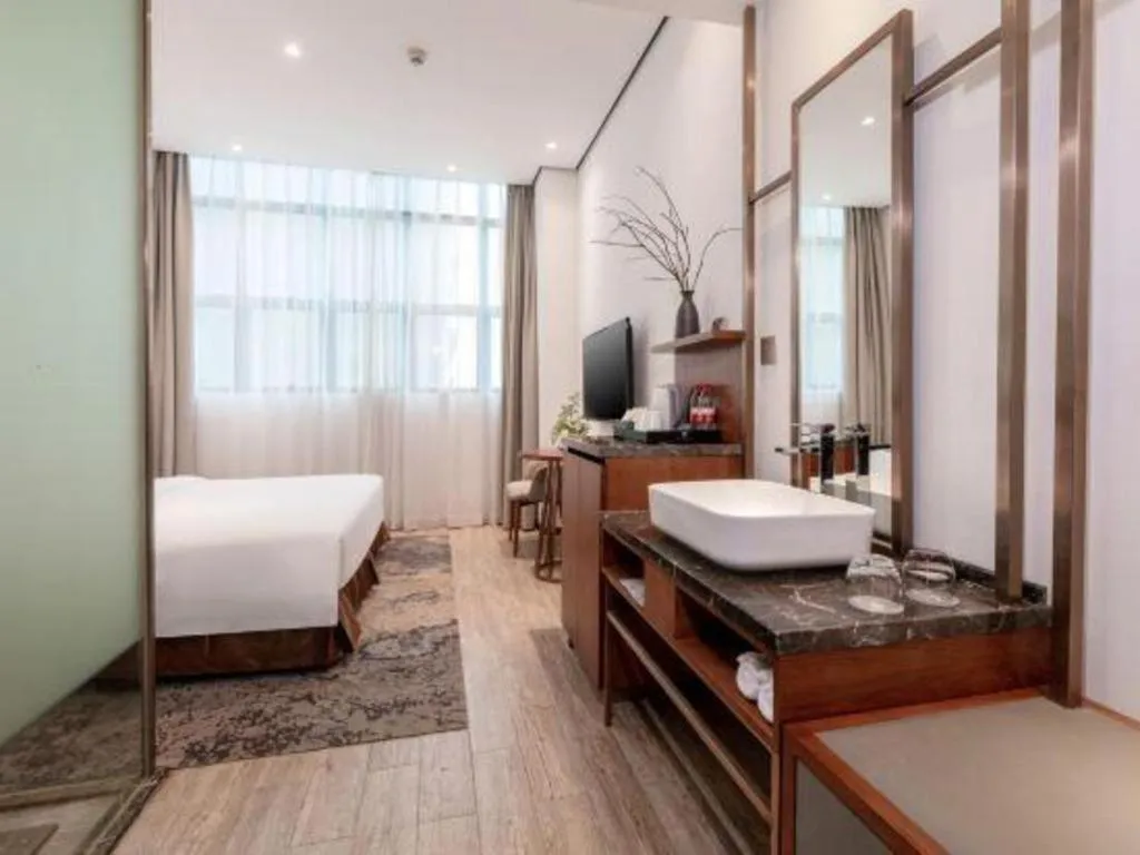 Bed in H Life Hotel (Shenzhen Sea World Branch)