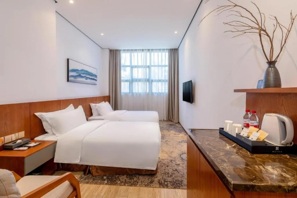 Bed in H Life Hotel (Shenzhen Sea World Branch)