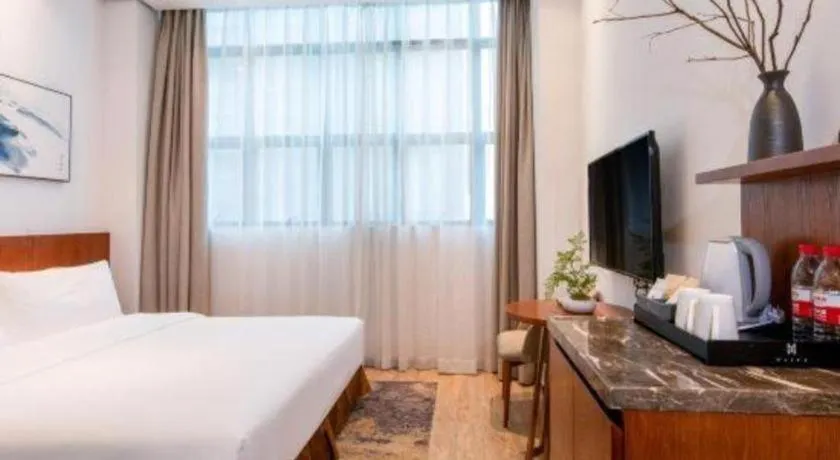 Bed in H Life Hotel (Shenzhen Sea World Branch)