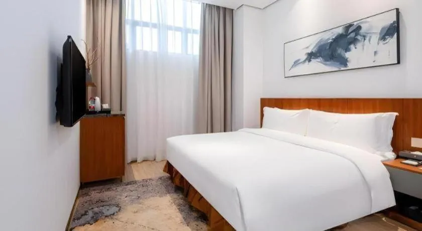 Bed in H Life Hotel (Shenzhen Sea World Branch)