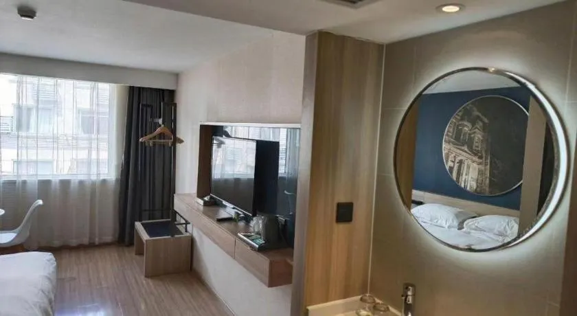 Bed in Ibis Styles Shanghai Qingpu Sports Center Hotel