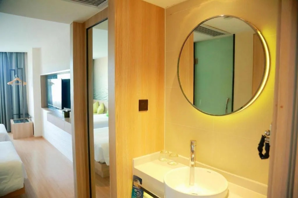 Bed in Ibis Styles Shanghai Qingpu Sports Center Hotel