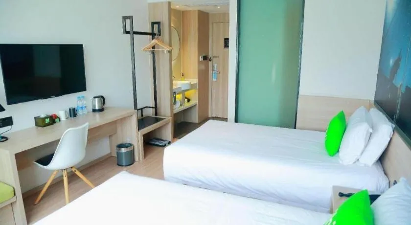 Bed in Ibis Styles Shanghai Qingpu Sports Center Hotel