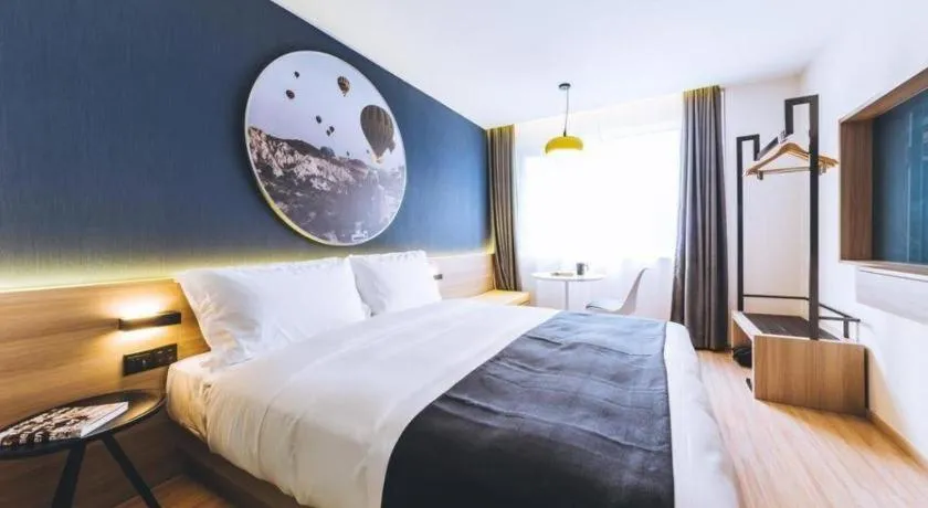 Bed in Ibis Styles Shanghai Qingpu Sports Center Hotel