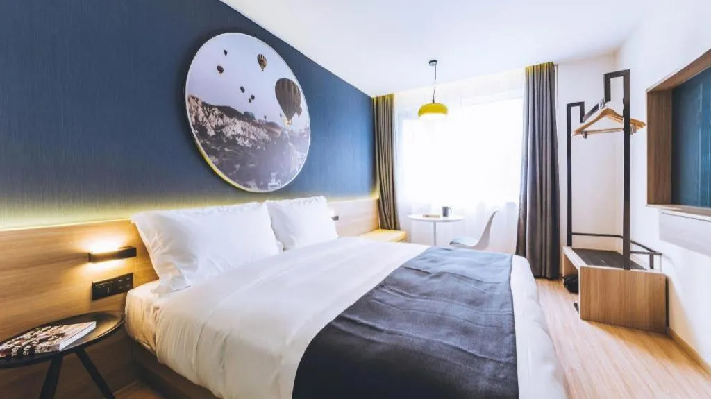 Bed in Ibis Styles Shanghai Qingpu Sports Center Hotel