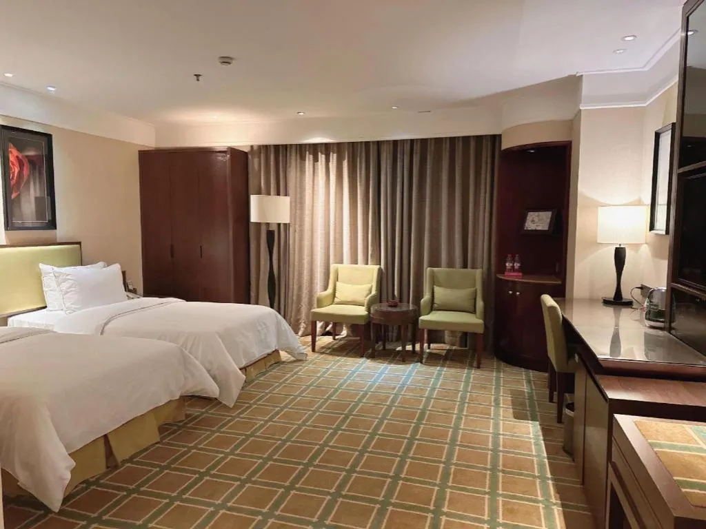 Bed in New Regent Hotel