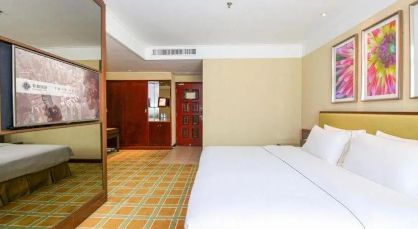 Bed in New Regent Hotel