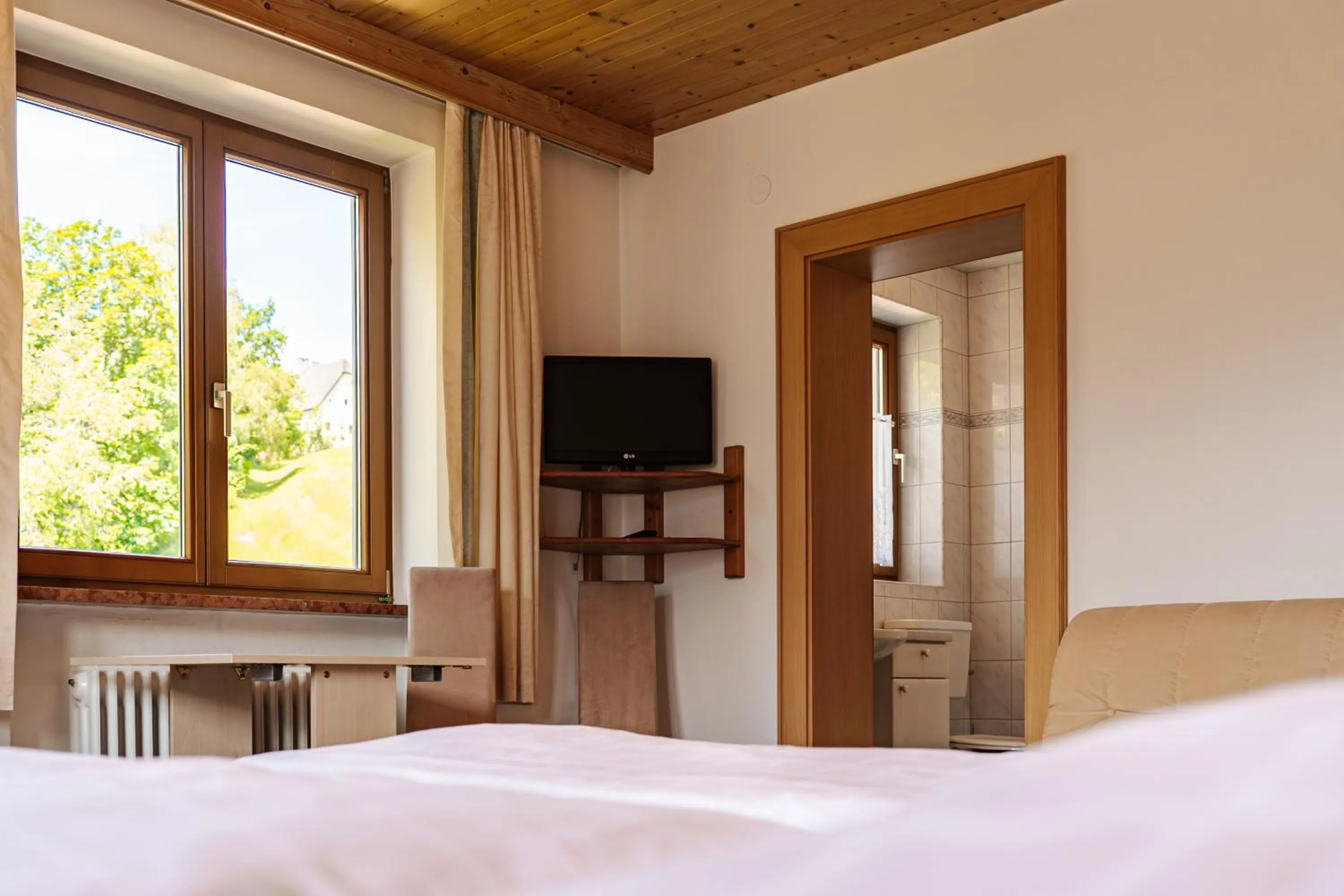 Photo of the whole room, Bed in Pension Schlossberg