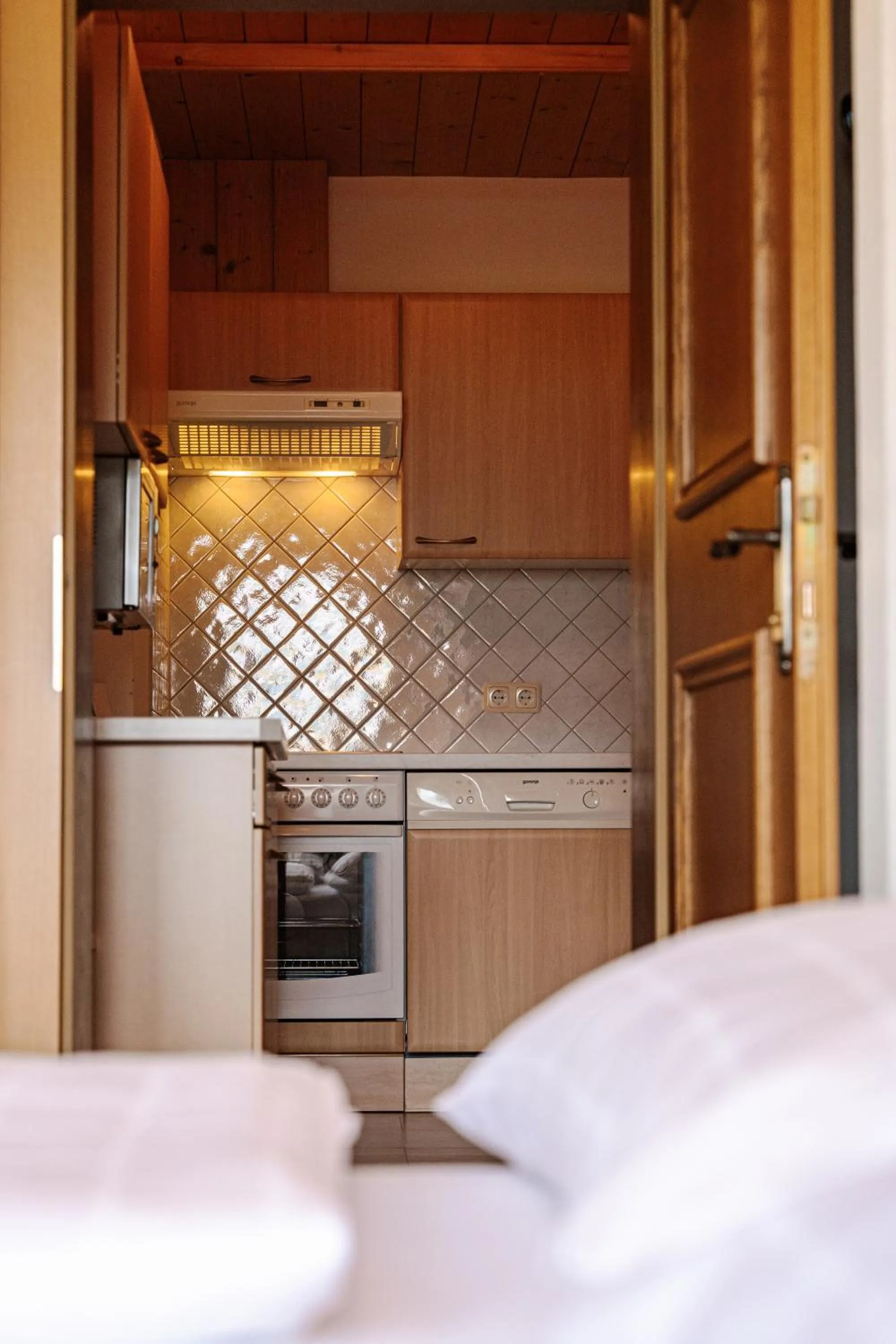 kitchen, Bed in Pension Schlossberg