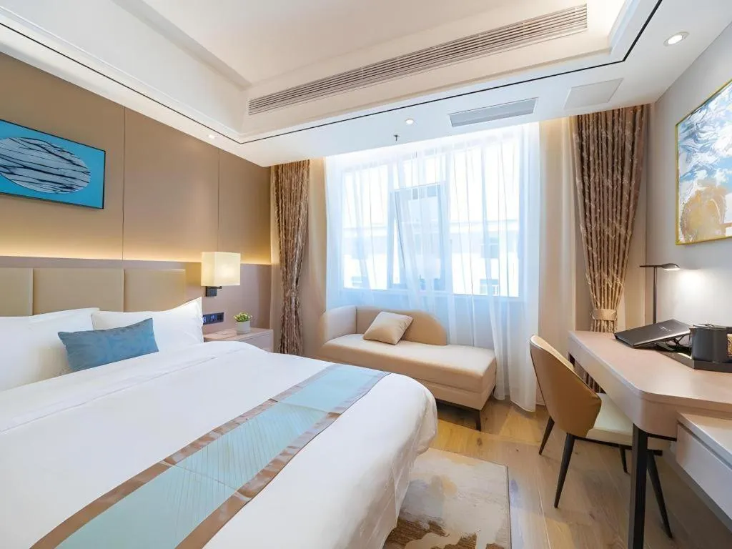 Bed in GreenTree Eastern Dali Railway Station Hotel