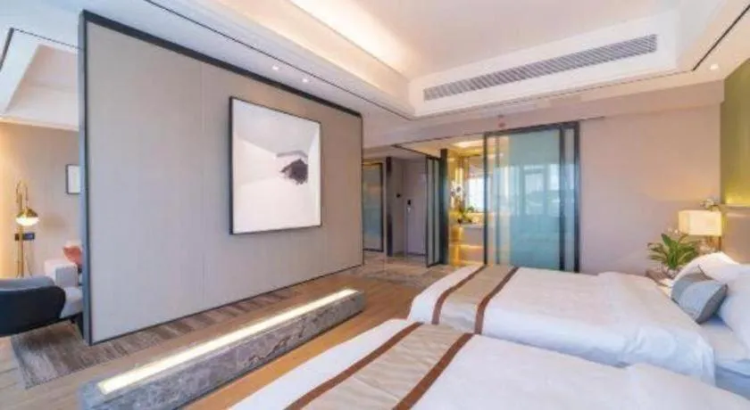 Bed in GreenTree Eastern Dali Railway Station Hotel