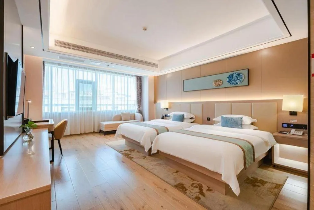 Bed in GreenTree Eastern Dali Railway Station Hotel