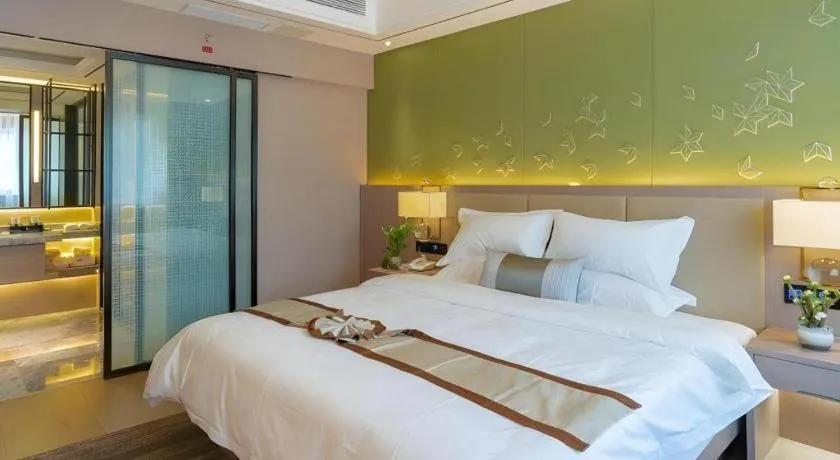 Bed in GreenTree Eastern Dali Railway Station Hotel