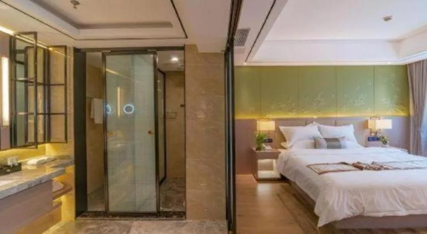 Bed in GreenTree Eastern Dali Railway Station Hotel