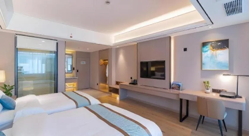 Bed in GreenTree Eastern Dali Railway Station Hotel