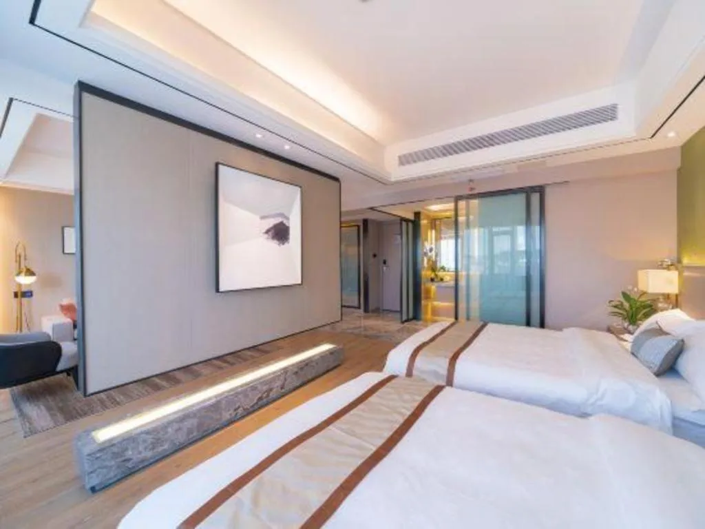 Bed in GreenTree Eastern Dali Railway Station Hotel