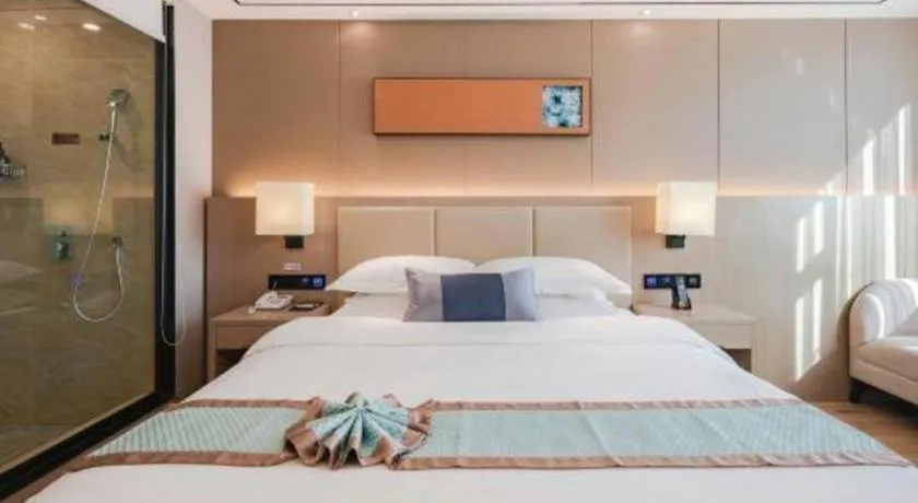 Bed in GreenTree Eastern Dali Railway Station Hotel