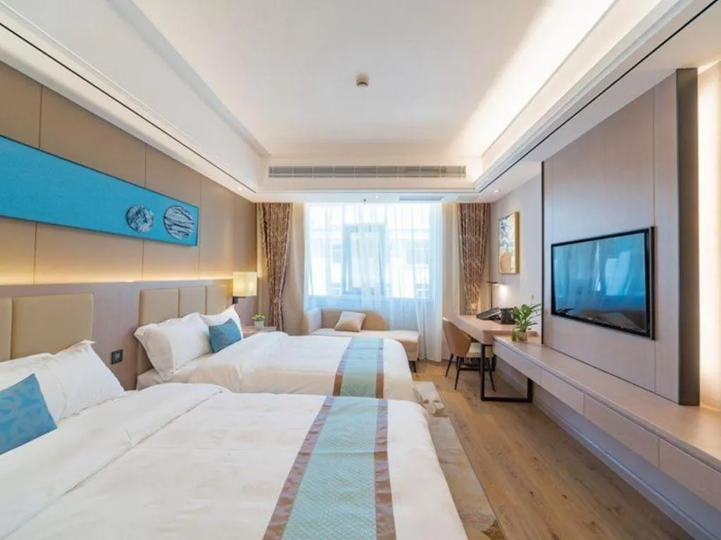 Bed in GreenTree Eastern Dali Railway Station Hotel