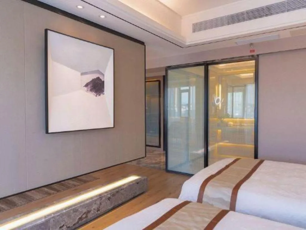 Bed in GreenTree Eastern Dali Railway Station Hotel