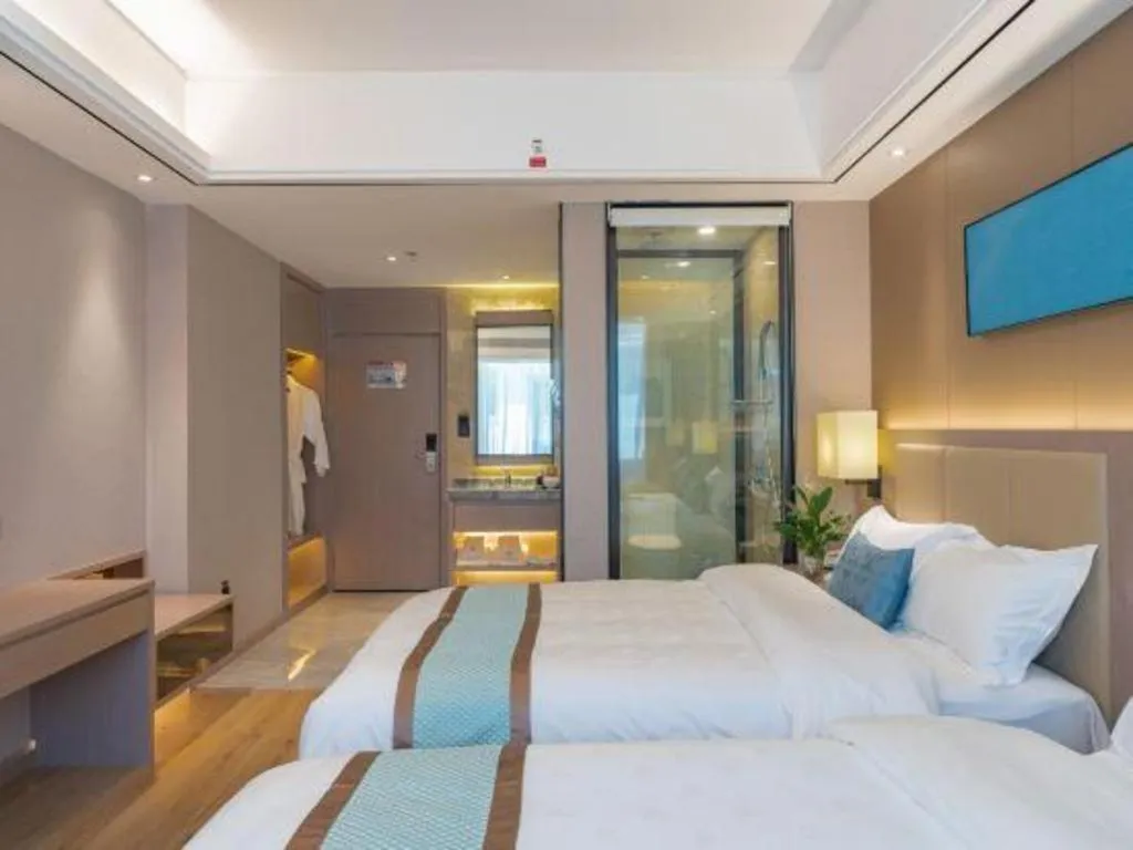 Bed in GreenTree Eastern Dali Railway Station Hotel