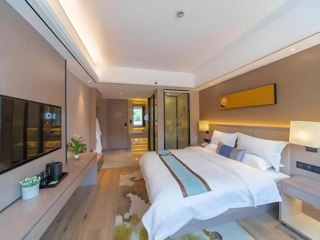 Bed in GreenTree Eastern Dali Railway Station Hotel