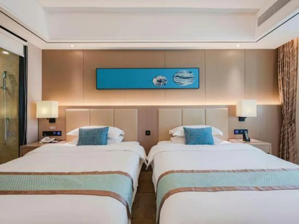 Bed in GreenTree Eastern Dali Railway Station Hotel