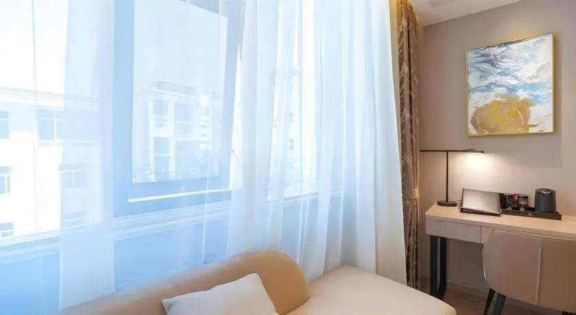 Bed in GreenTree Eastern Dali Railway Station Hotel