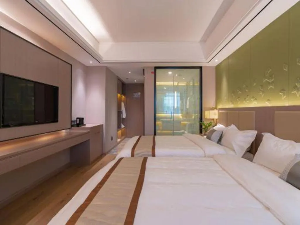 Bed in GreenTree Eastern Dali Railway Station Hotel