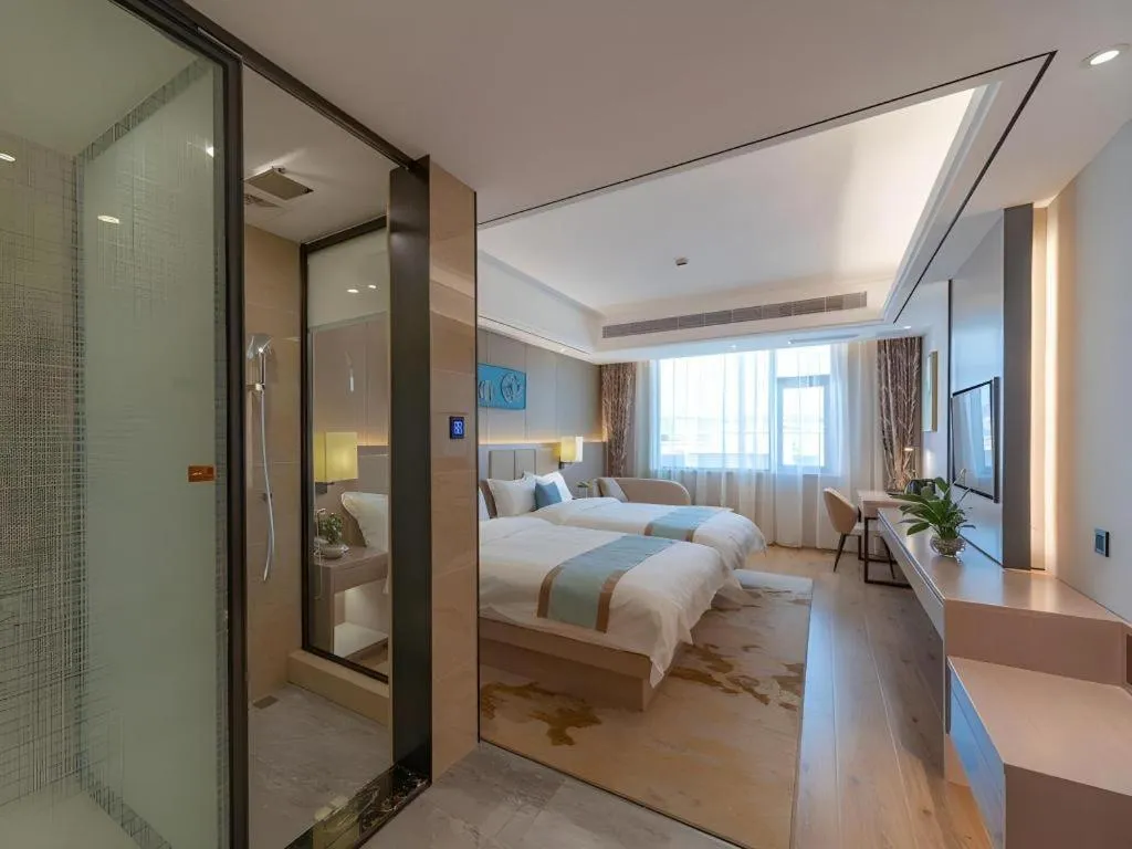 Bed in GreenTree Eastern Dali Railway Station Hotel