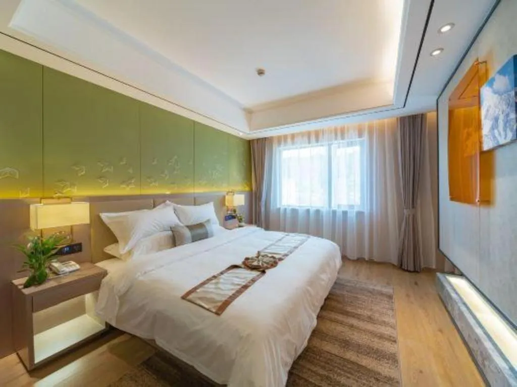 Bed in GreenTree Eastern Dali Railway Station Hotel