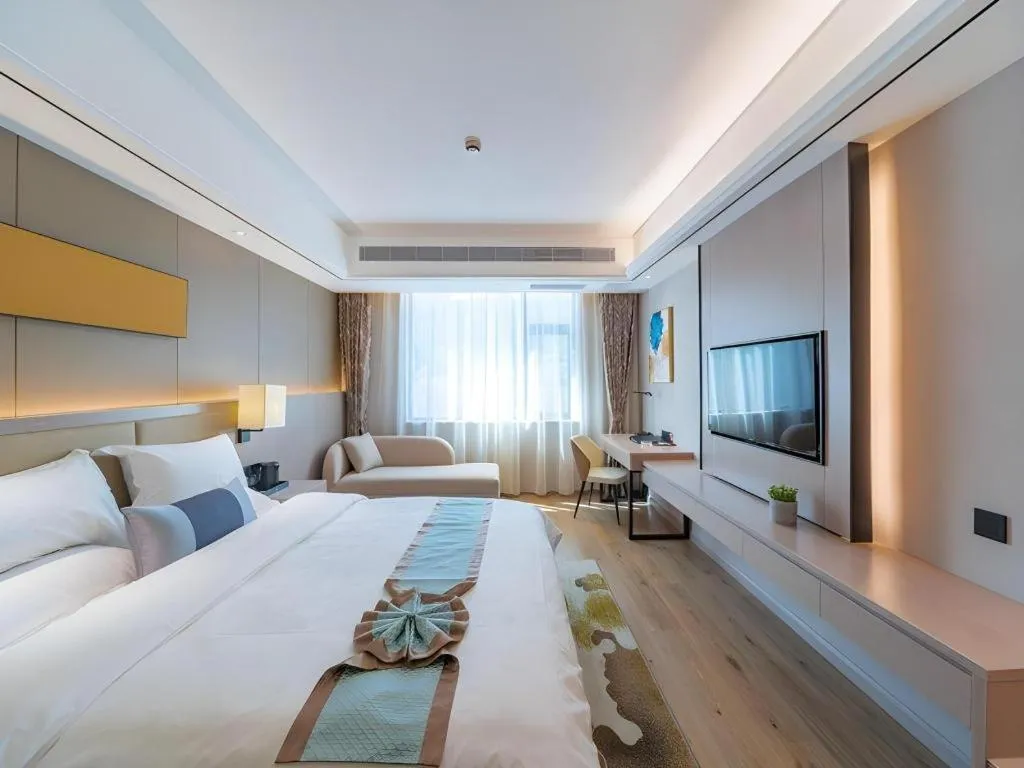 Bed in GreenTree Eastern Dali Railway Station Hotel