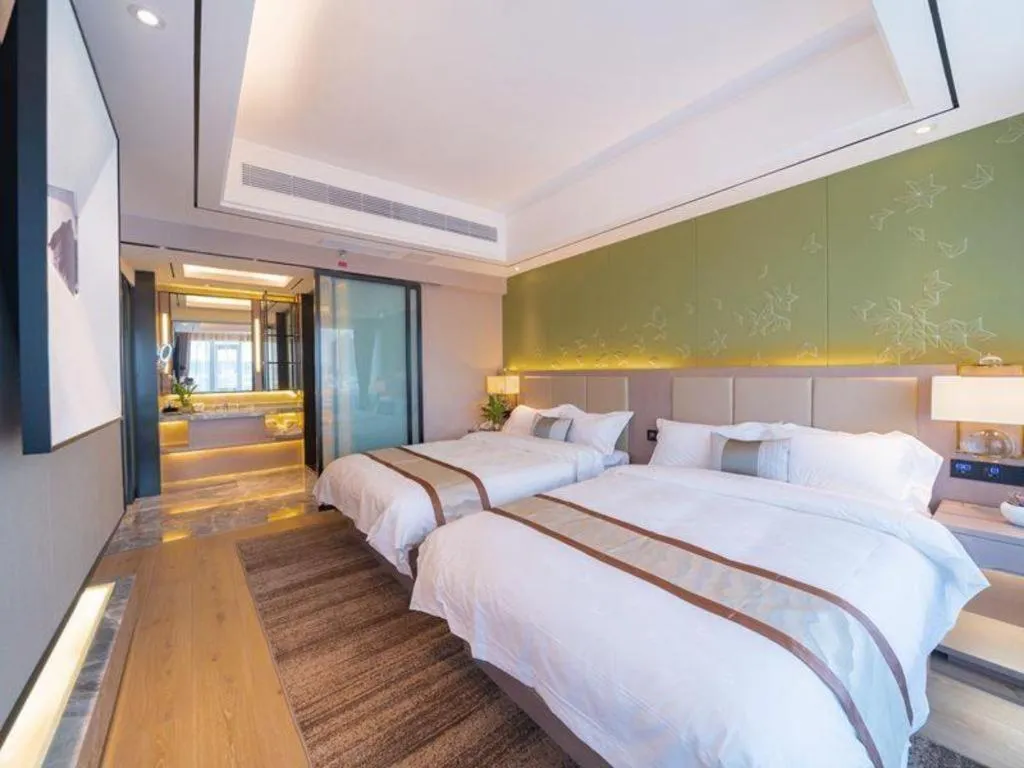 Bed in GreenTree Eastern Dali Railway Station Hotel