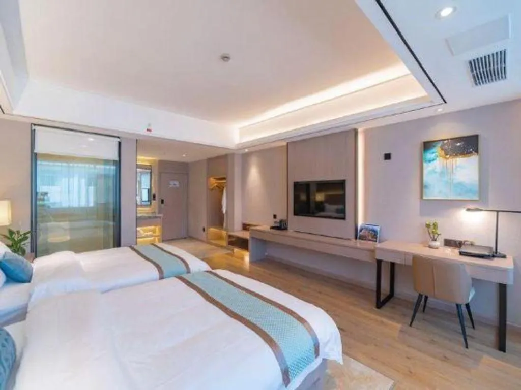 Bed in GreenTree Eastern Dali Railway Station Hotel