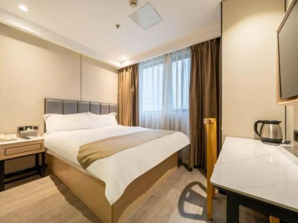 Bed in GreenTree Inn Shanghai Railway Station Macao Road