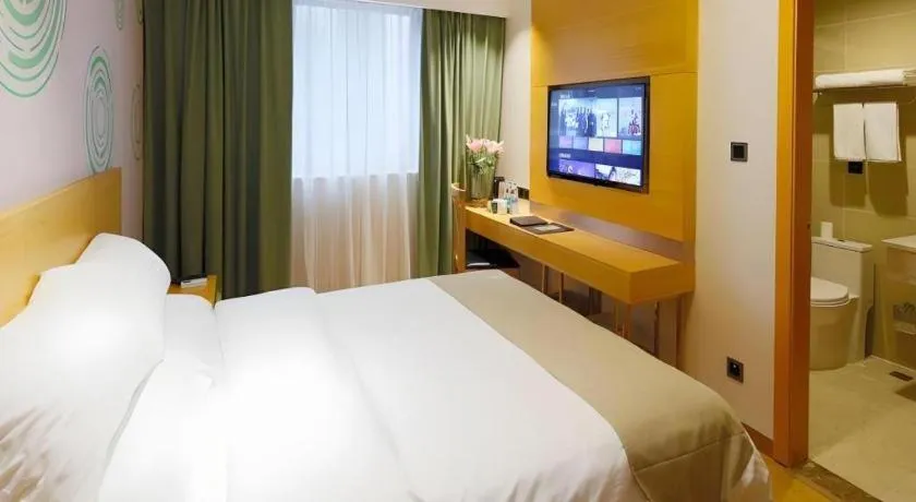 Bed in GreenTree Inn Shanghai Railway Station Macao Road
