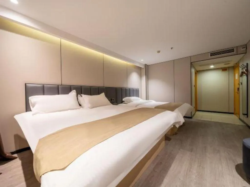 Bed in GreenTree Inn Shanghai Railway Station Macao Road