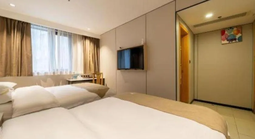 Bed in GreenTree Inn Shanghai Railway Station Macao Road