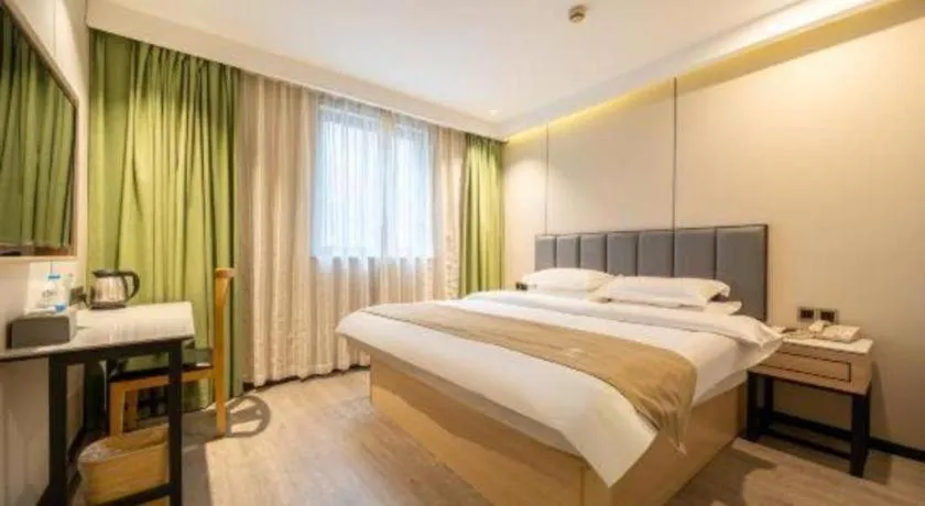 Bed in GreenTree Inn Shanghai Railway Station Macao Road