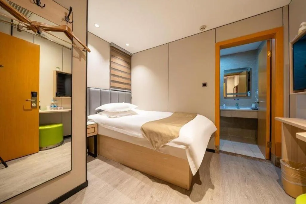 Bed in GreenTree Inn Shanghai Railway Station Macao Road