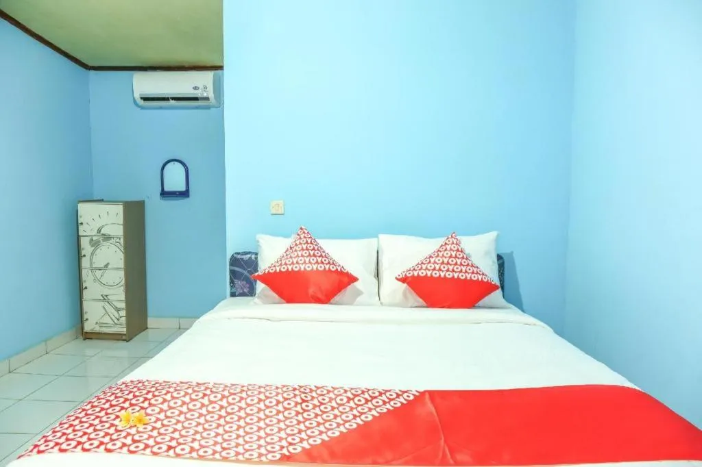 Bed in OYO 1662 Zury Homestay