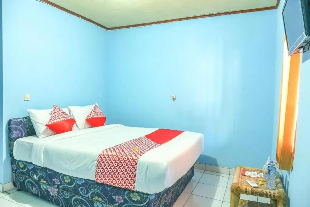Bed in OYO 1662 Zury Homestay