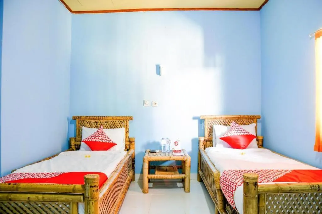 Bed in OYO 1662 Zury Homestay