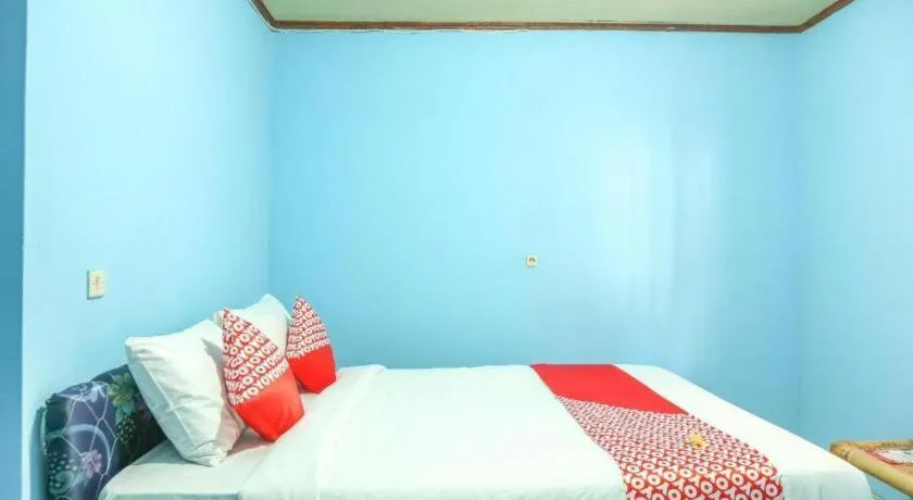Bed in OYO 1662 Zury Homestay