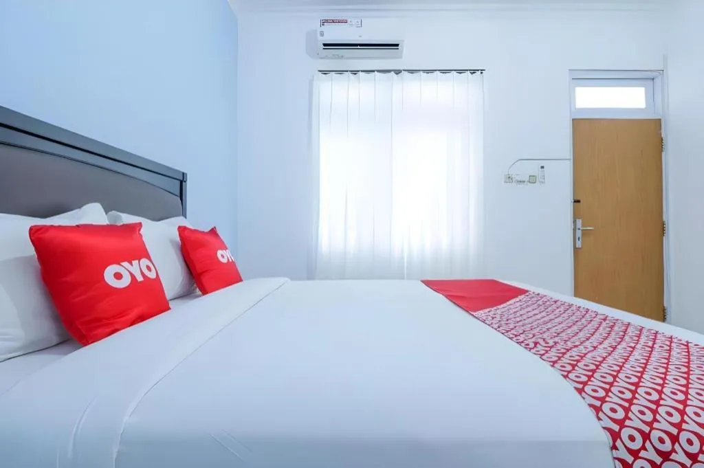 Bed in OYO 1755 De'balcon Accomodation Near Ngurah Rai Airport