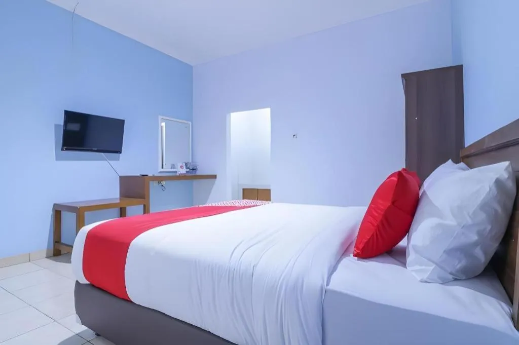 Bed in OYO 1755 De'balcon Accomodation Near Ngurah Rai Airport